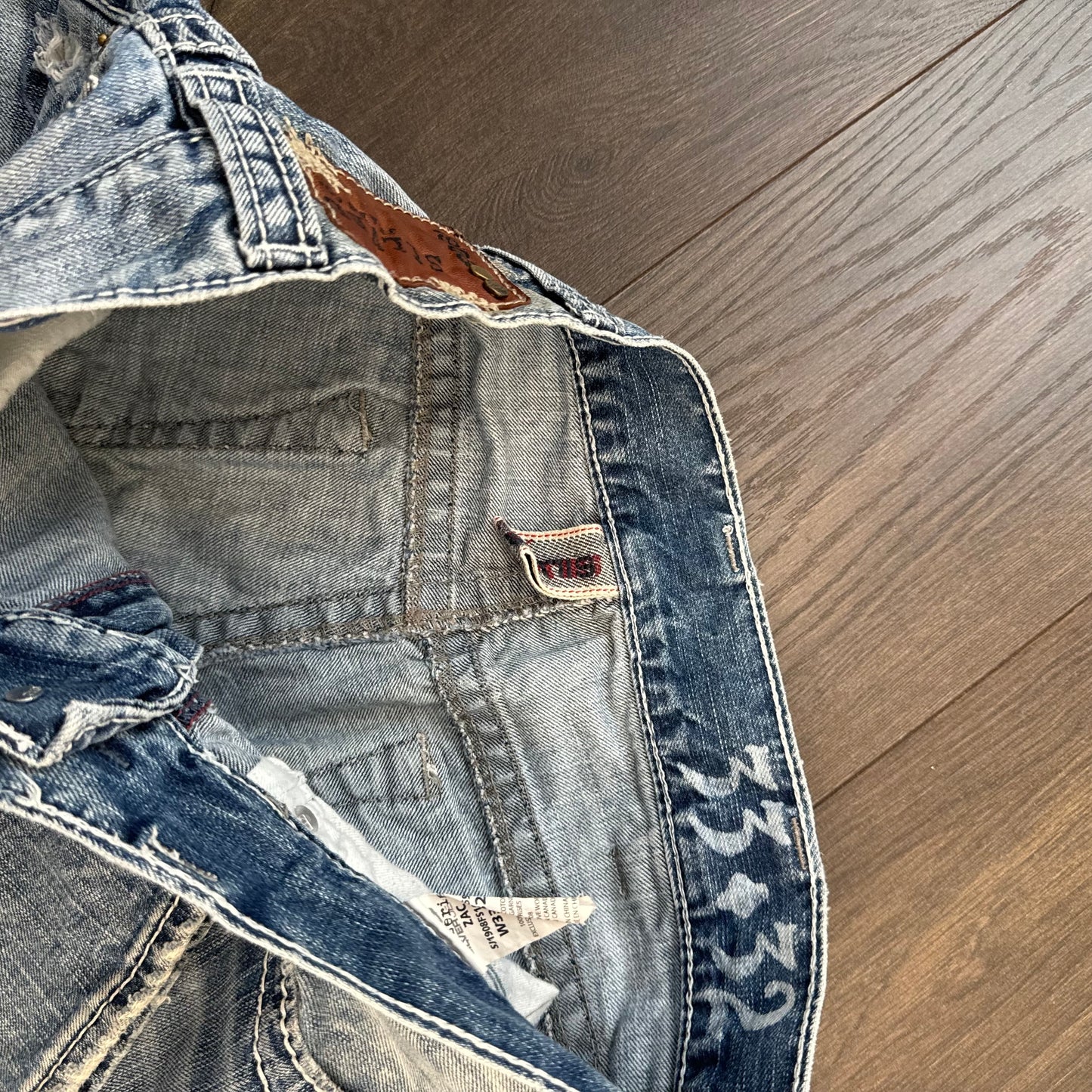 Silver Faded Low Rise Straight Cut Distressed Jeans