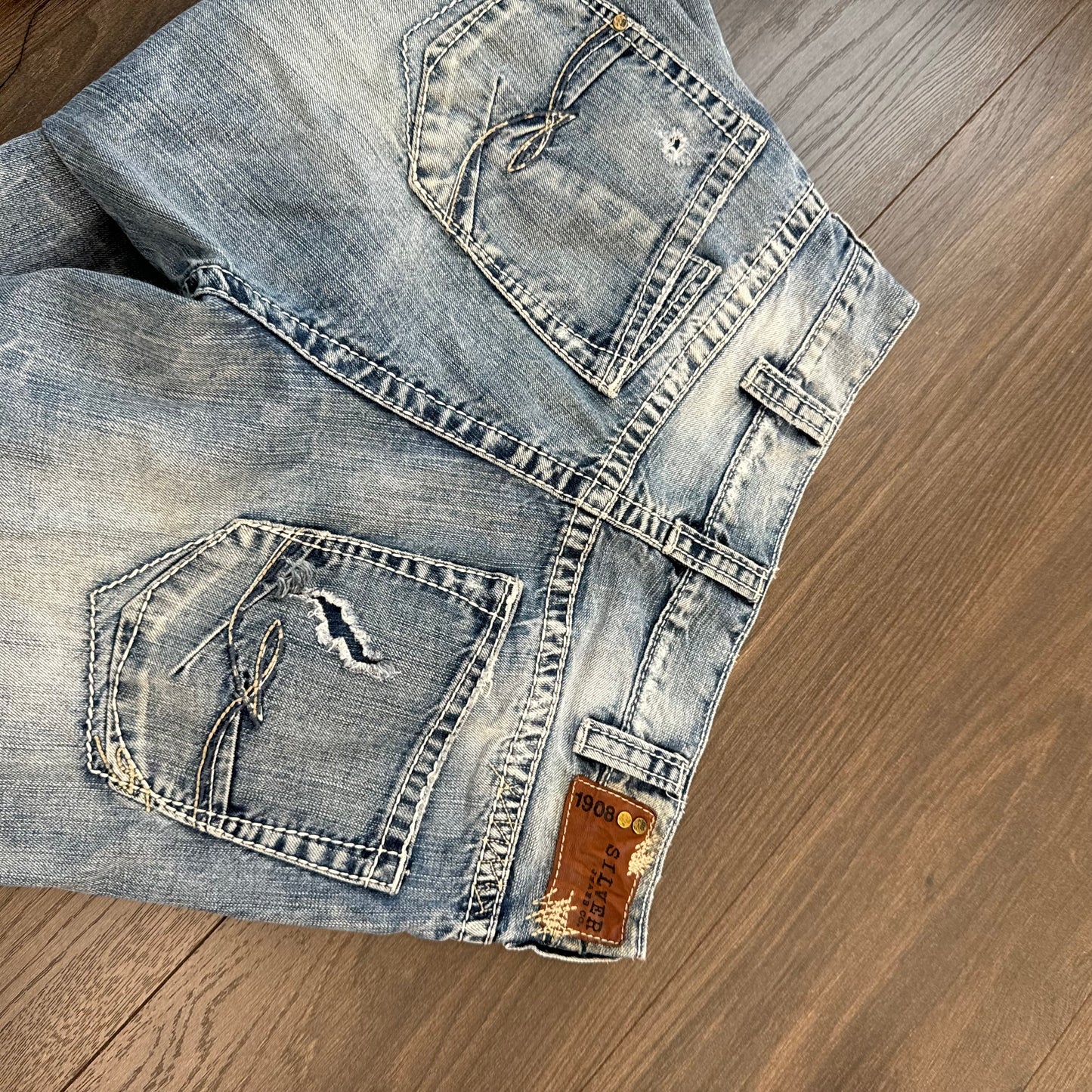 Silver Faded Low Rise Straight Cut Distressed Jeans