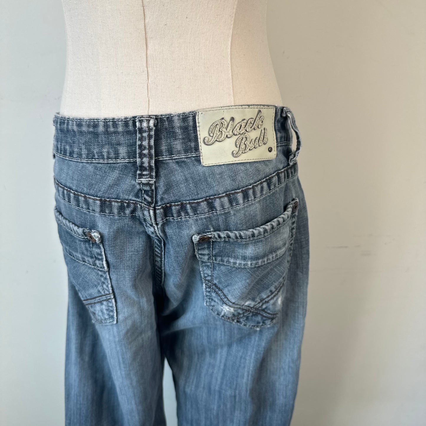 Faded Light Wash Rock Star Low Rise Straight Leg Jeans