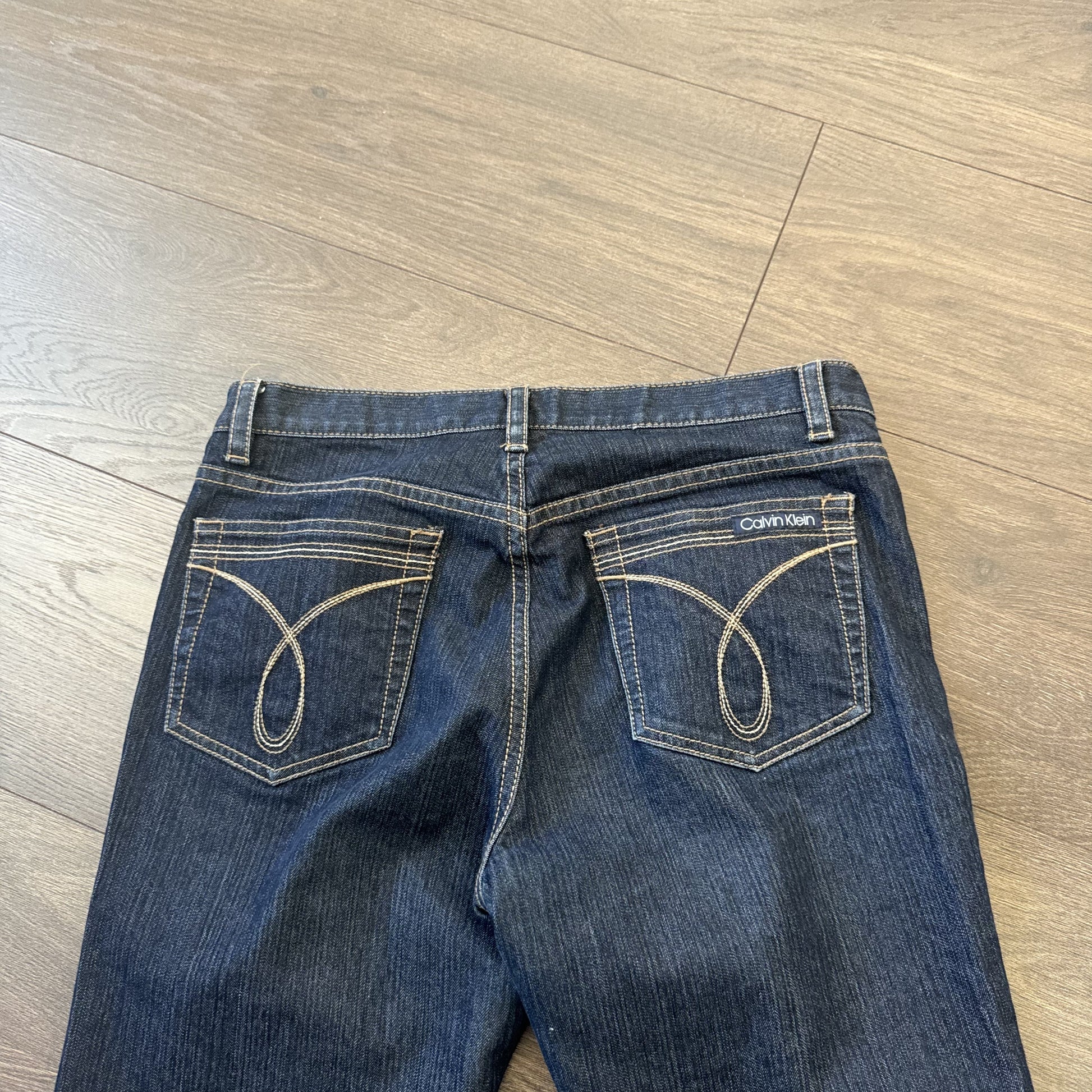 Calvin Klein Dark Wash Mid Rise Flared Jeans – view 9