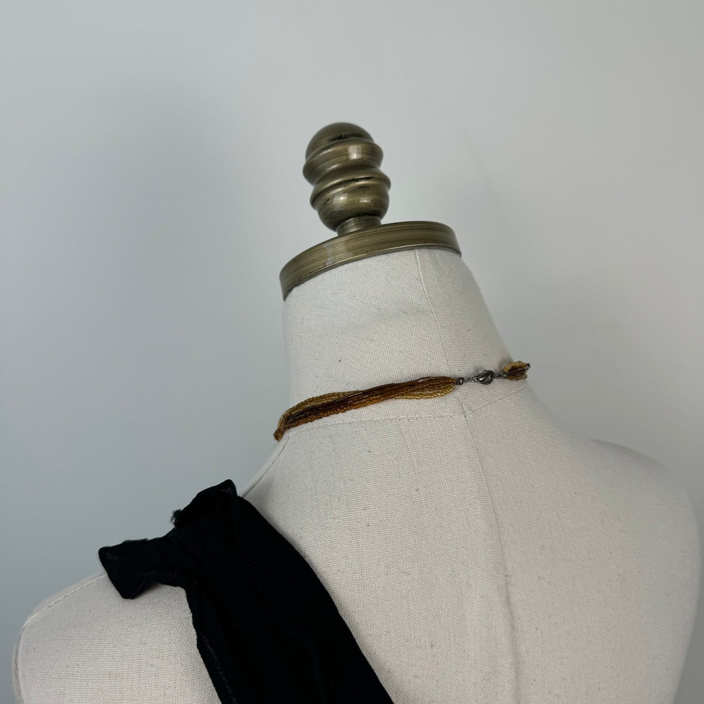 Brown Multi-Strand Beaded Necklace with Black Pendant