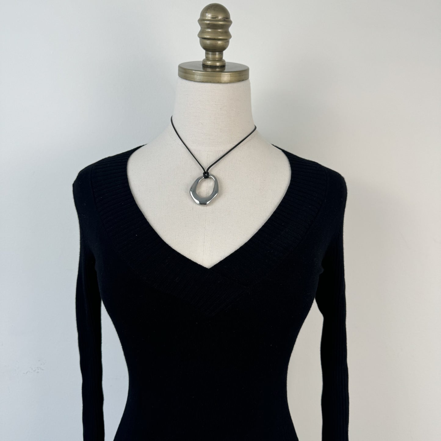 Le Chateau Black Fitted V-Neck Sweater with Buckle Waist Detail – view 8