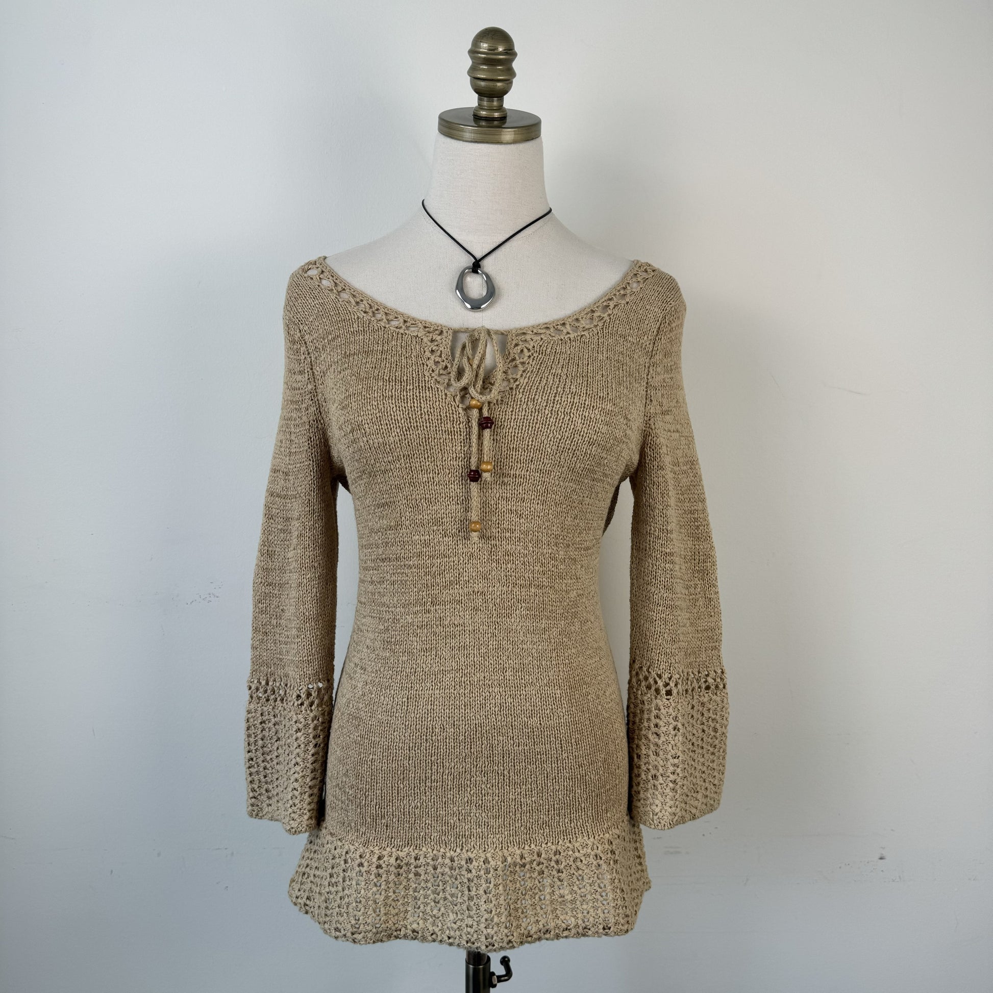 Vintage Boho Knit Top with Tie-Up Neckline and Beaded Details